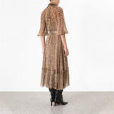 Robe bohème style chic mi longue luxe
